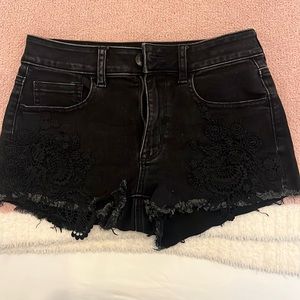 Black denim cut off shorts with lace overlay
